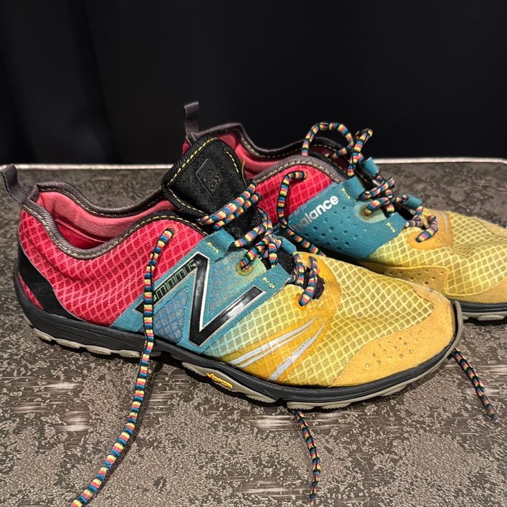 New Balance Red, Blue, and Yellow Trail Shoes